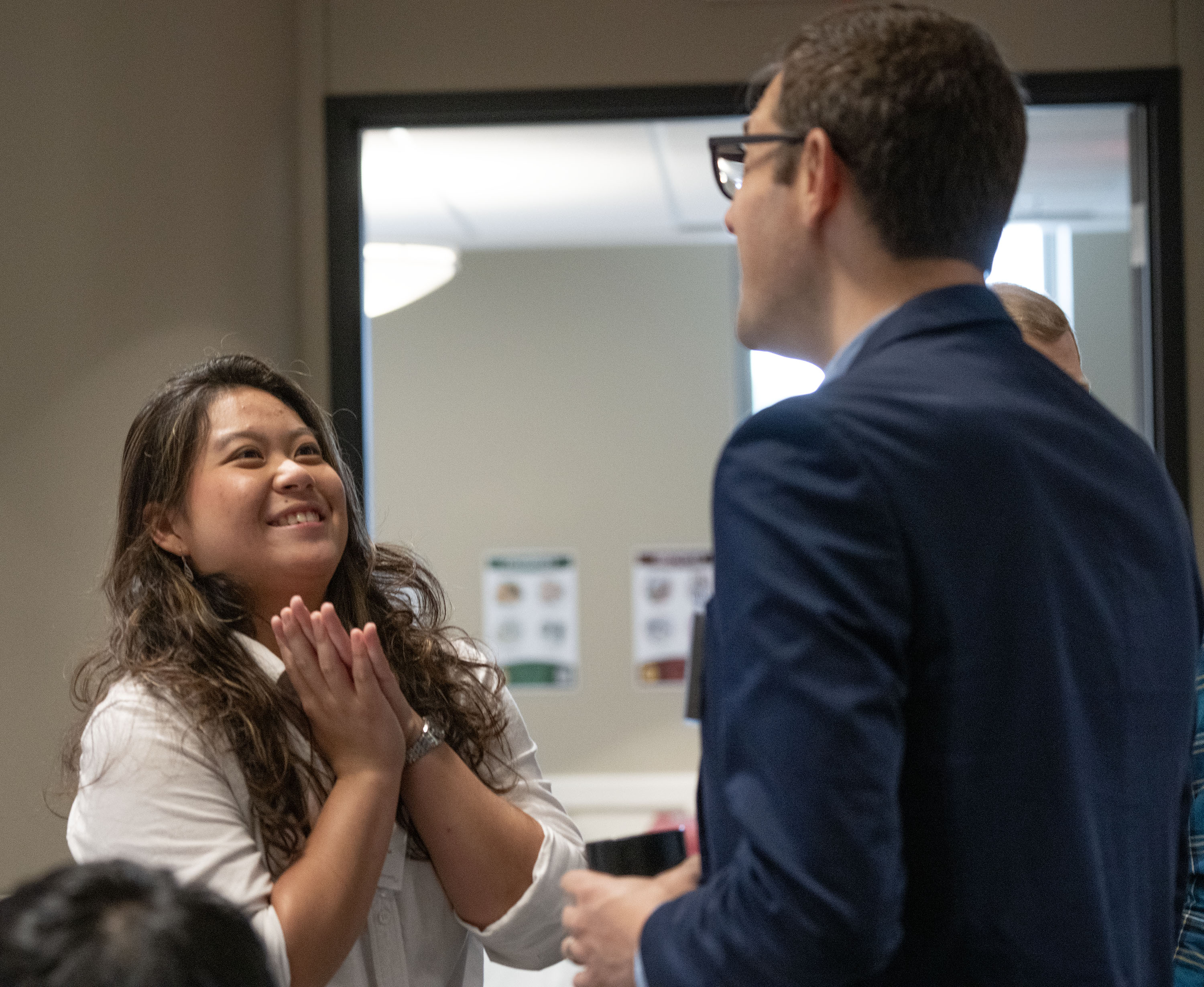 Hubbard School media and information major Wilma Agustianto, left, speaks with professor Benjamin Toff during the third symposium on the Minnesota Poll's 80 years at Coffman Memorial Union on Sept. 19, 2025. Photo by Judy Griesedieck for the MJC